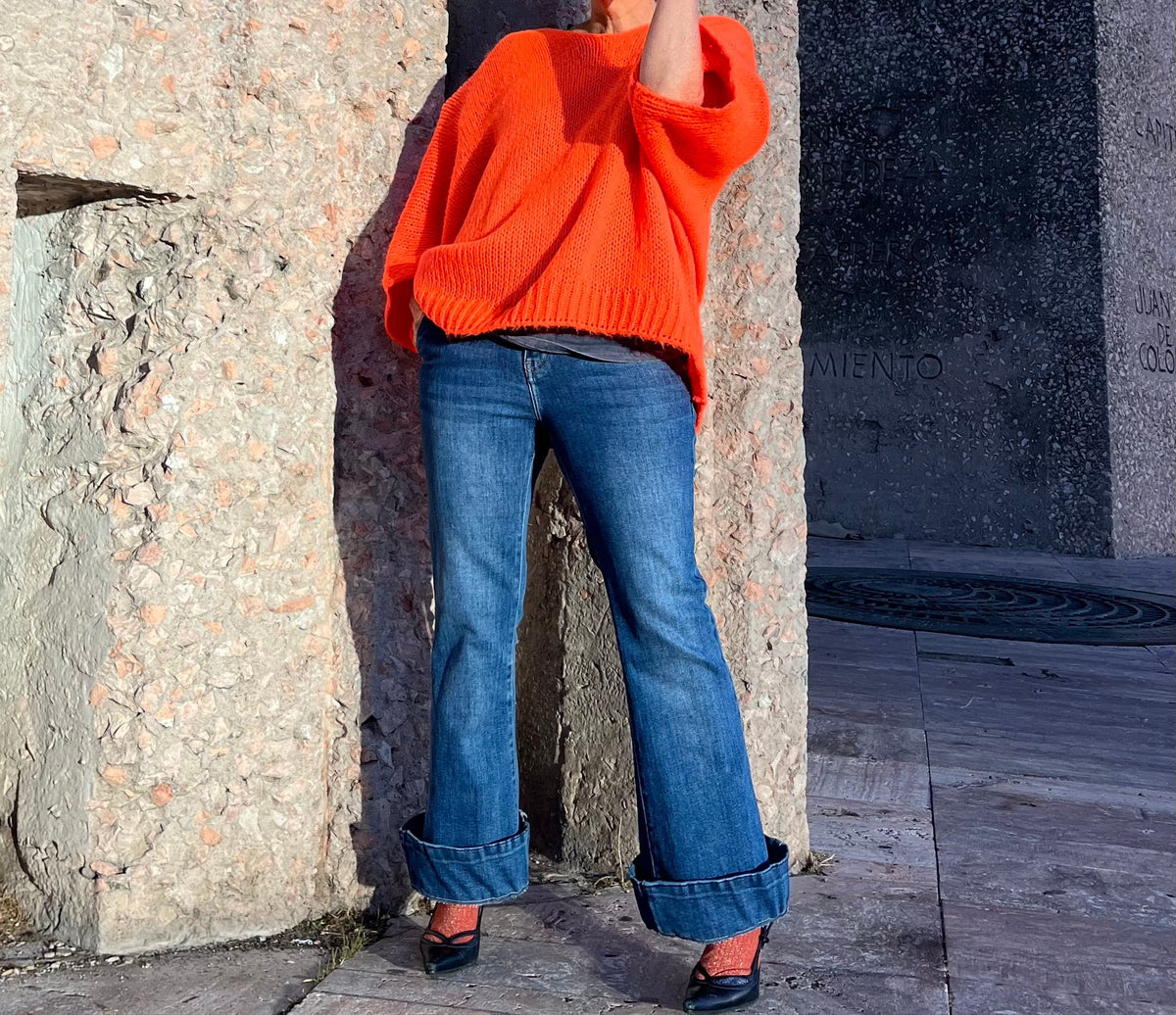 Neon orange oversized knit sweater by La Canaria