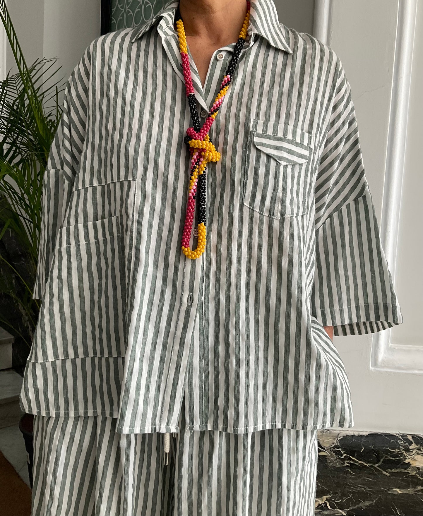 Conjunto rayas oversize efecto falda verde