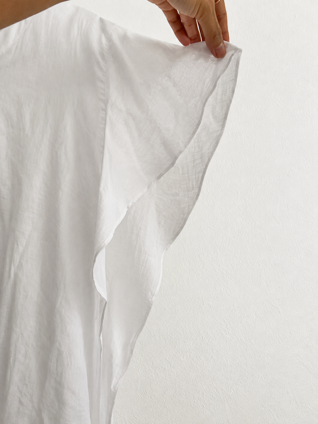 Vestido de lino blanco diseño asimétrico