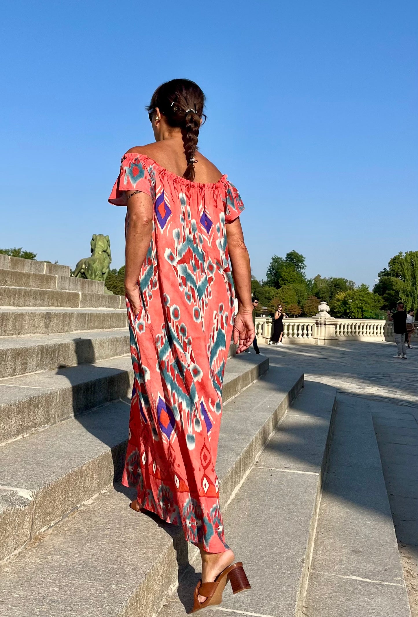 Vestido largo estampado coral con bolsillos,