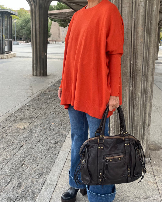 Jersey de punto naranja, vista lateral y largo